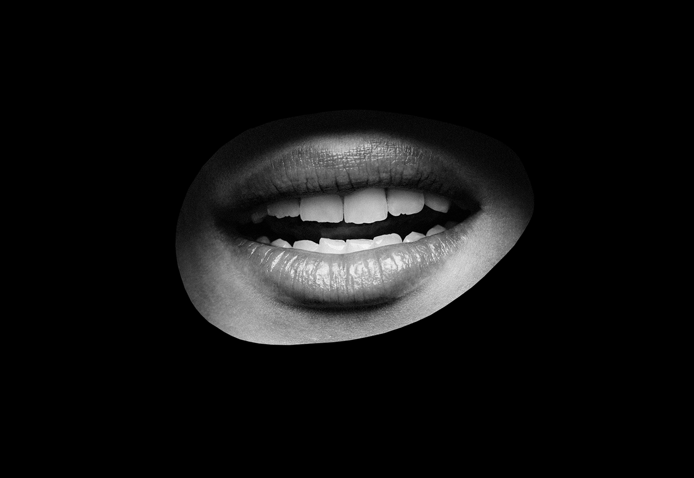 A black and white abstract image of a mouth