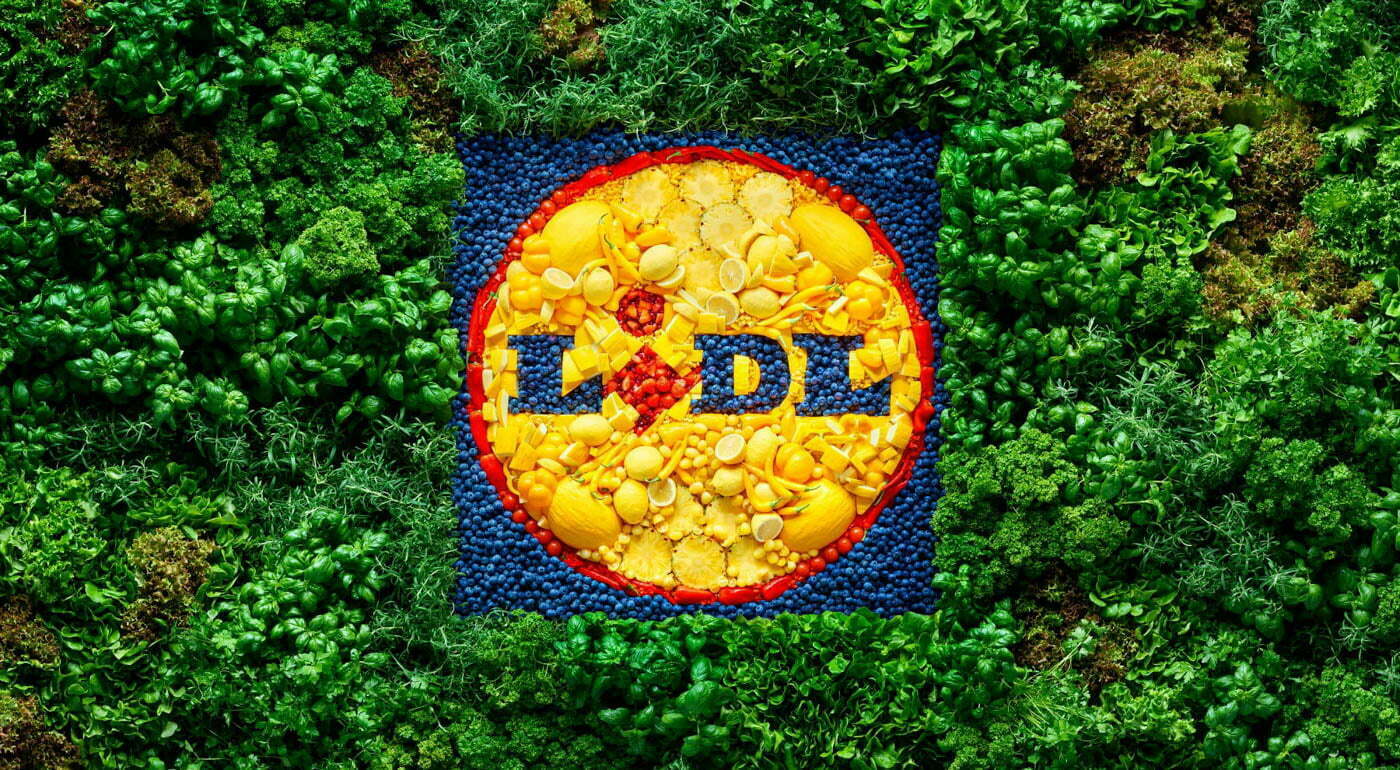 Lidl green texture wall by Mikko Tikka. Massive still life composition of herbs, fruits and berries.