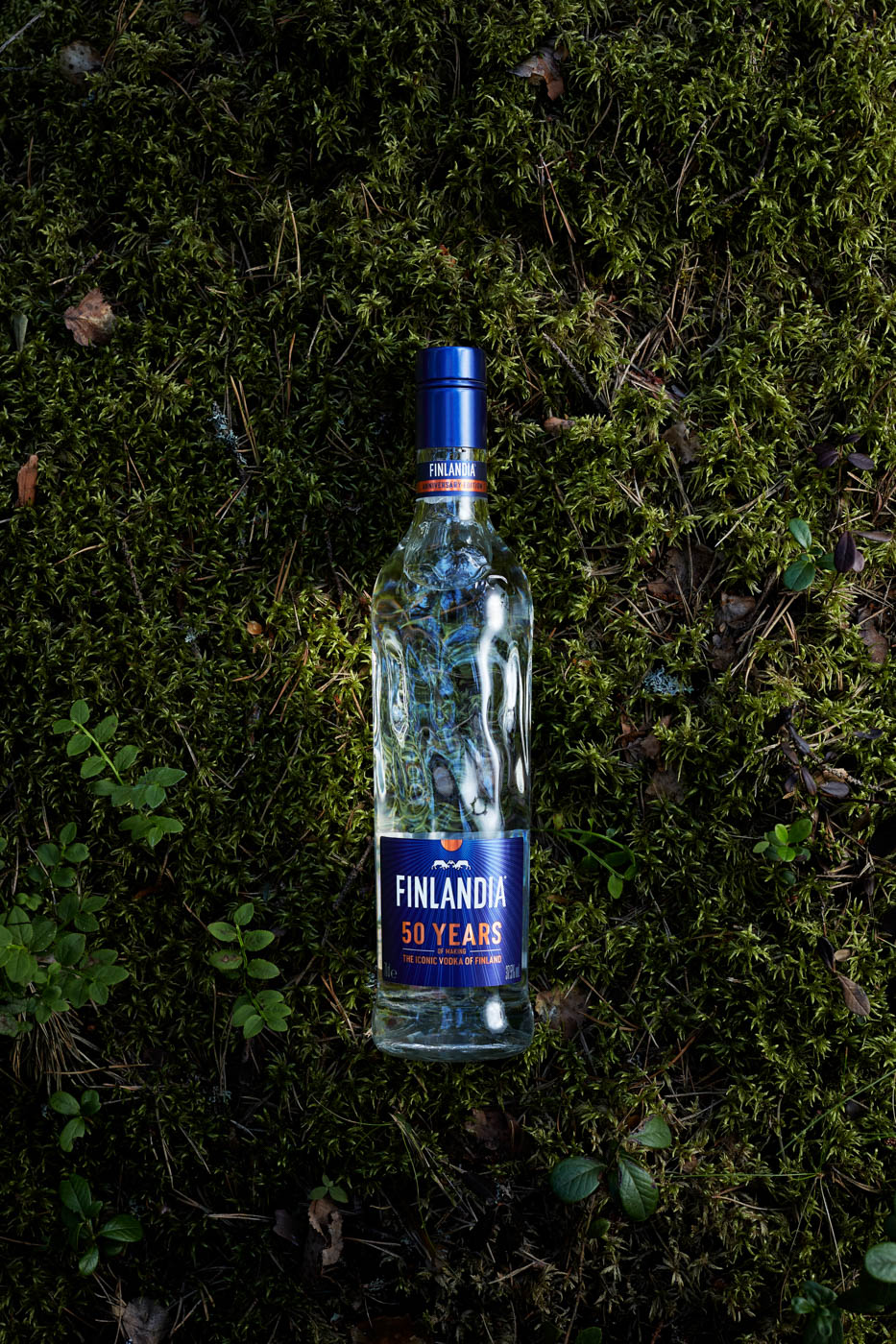 Finlandia_Vodka_bottle_in_a_forest_and_morning_sun_by_Tapio_Ranta-aho