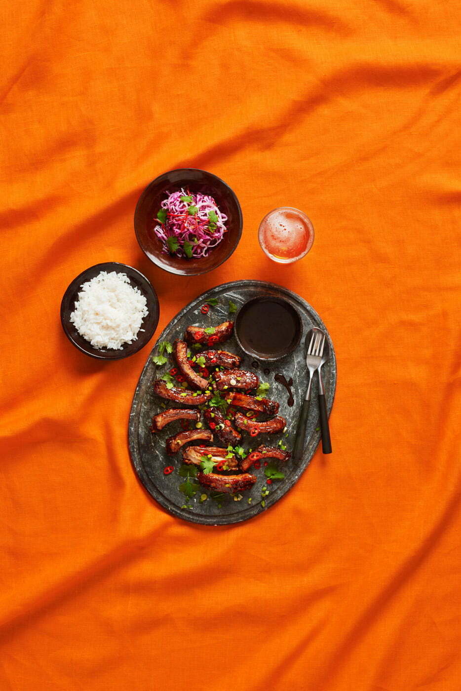 Ribs_serving_on_a_orange_tablecloth_by_Elina_Himanen