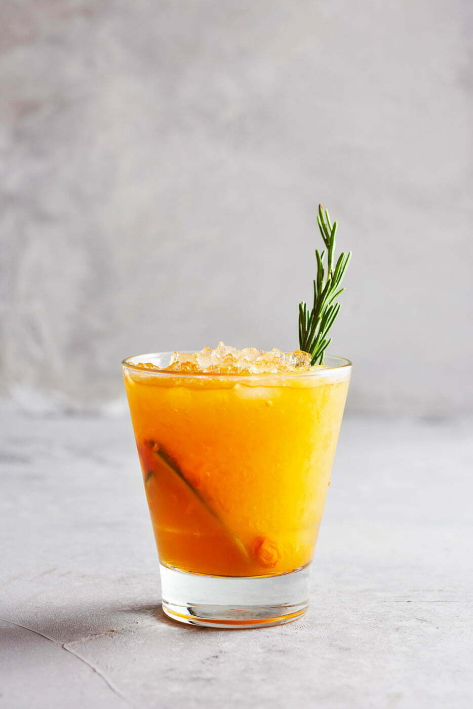 A_Orange_Cocktail_with_rosemary_knot_and_ice_by_Chaos_Restaurant_by_Elina_Himanen
