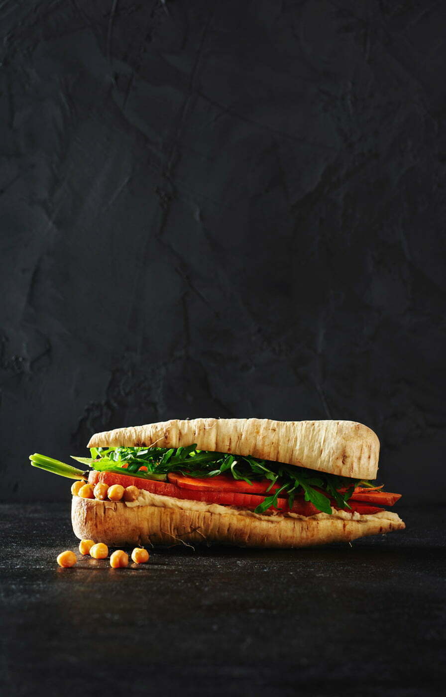 A_Parsnip_with_chickpeas,_carrots_and_rucola_on_a_dark_background_by_Elina_Himanen