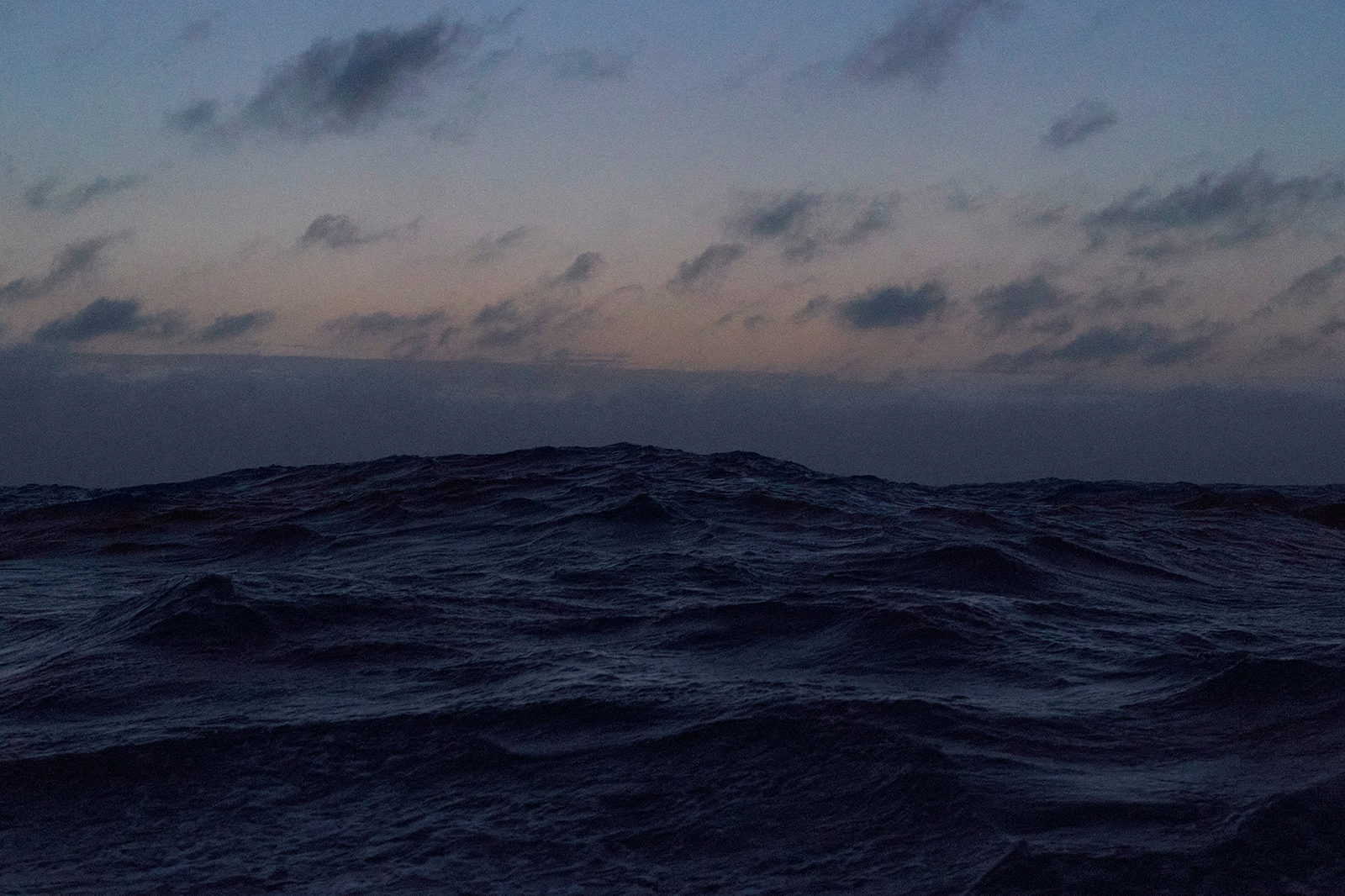 The Midnight Ocean is a photograph taken in the middle of the Atlantic ocean at blue hour