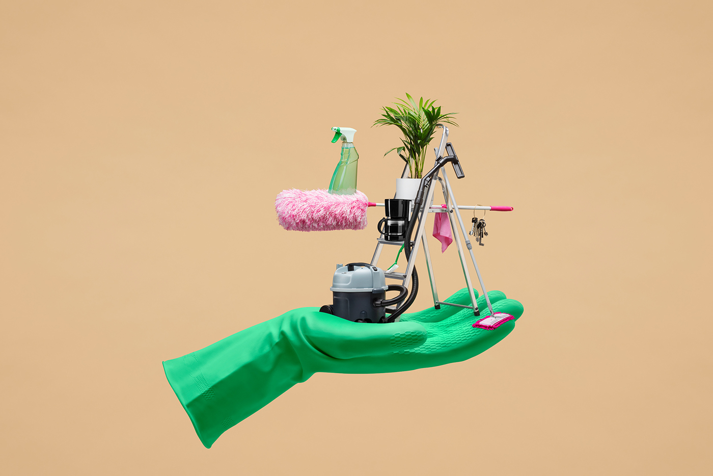 A green glove holding several objects in it's palm on a beige by Tomas Olsen